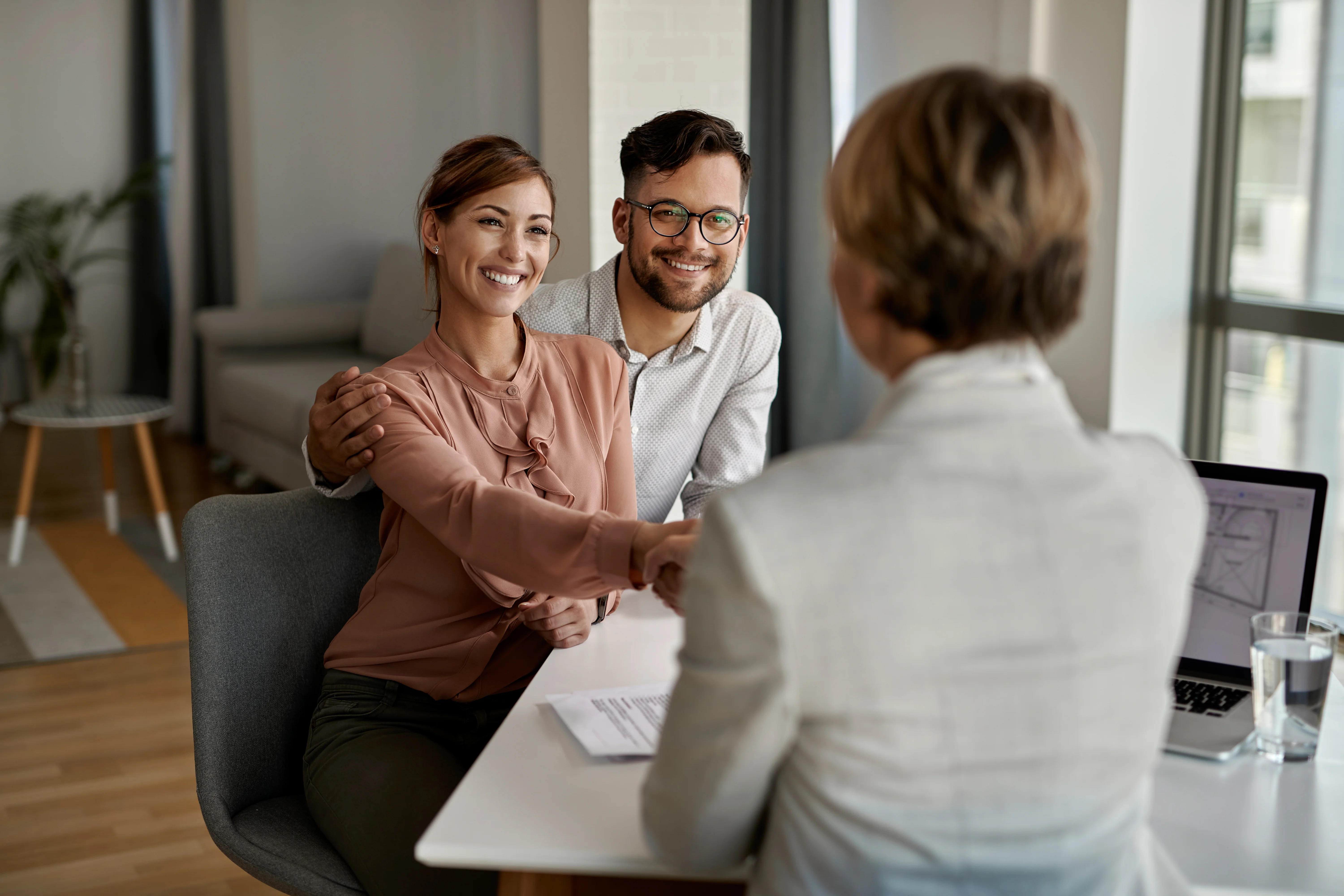 Couple discussing health insurance coverage after moving